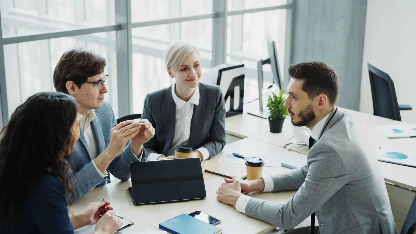 International colleagues planning a cross-border hiring process